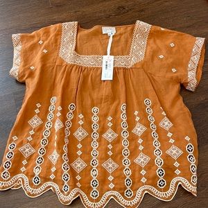 Johnny was: Jade brand shirt